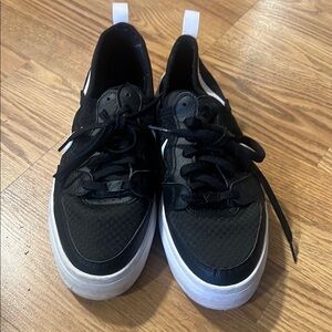 Womanss Black and White Sneakers